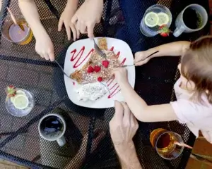 Reynolda - Family eating