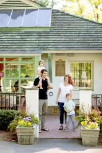 Reynolda - Family in front of building