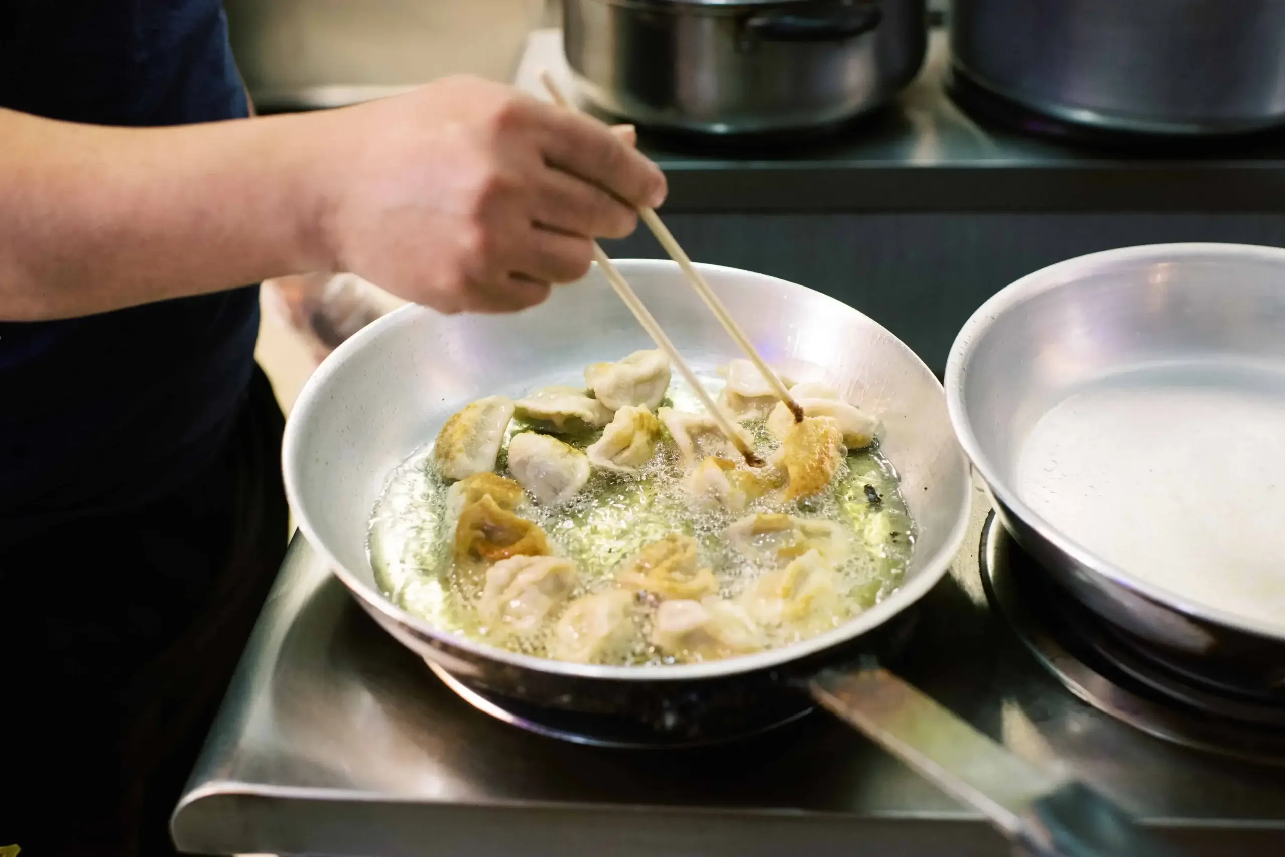 Reynolda Village - May Way Dumplings - dumplings in pan being prepared